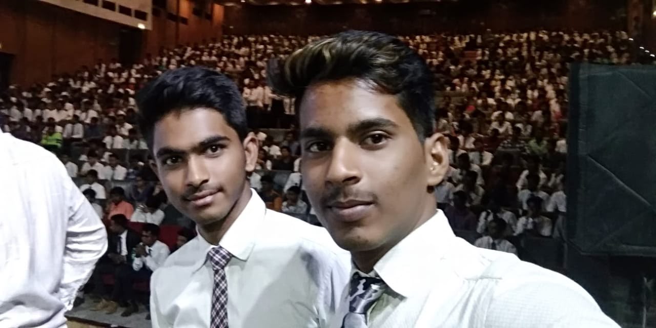 Coach Sreenivas Paturi with large audience in auditorium