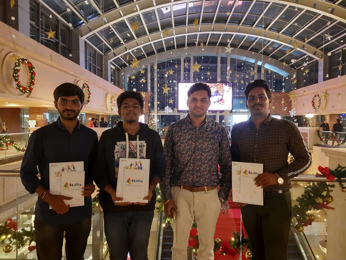 Coach Sreenivas Paturi celebrating certificates with students